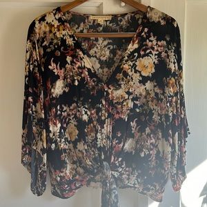 Floral top with front tie and mid length sleeves